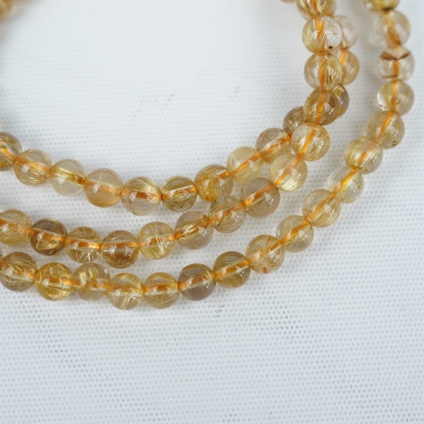 Chuỗi tóc vàng 118hạt 295976 kt6.53-4.39ly KG+