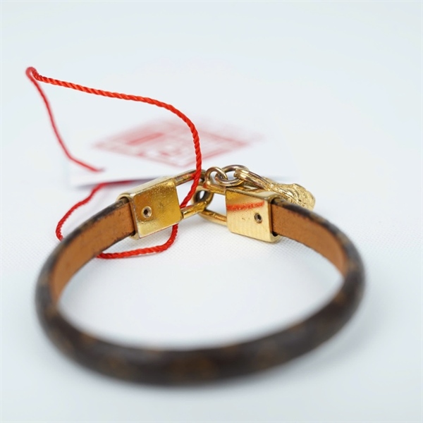 Vòng tay LV hoa nâu túi vàng (L-N) KG+