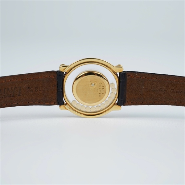 Đồng hồ Chopard mặt vàng dây đen kim zin (238833) sz33.2 (HC) KG+