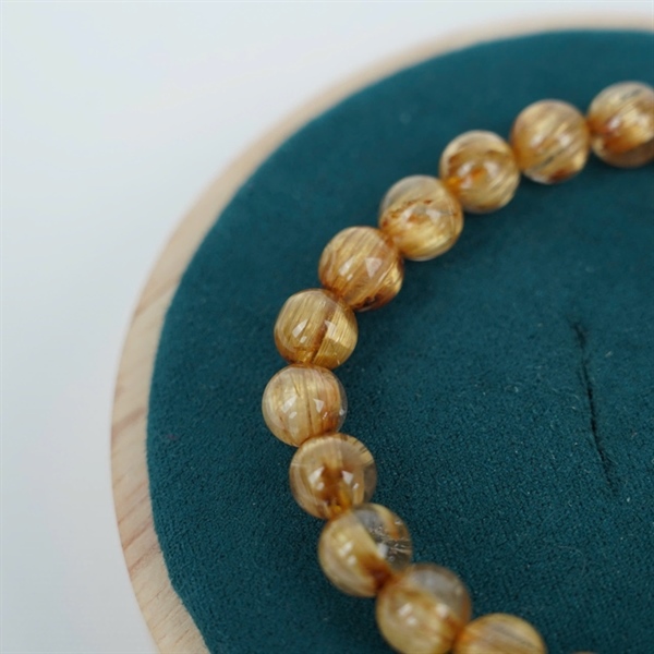 Vòng tay tóc vàng 23 hạt ly8.44-8.06 (467256) KG+