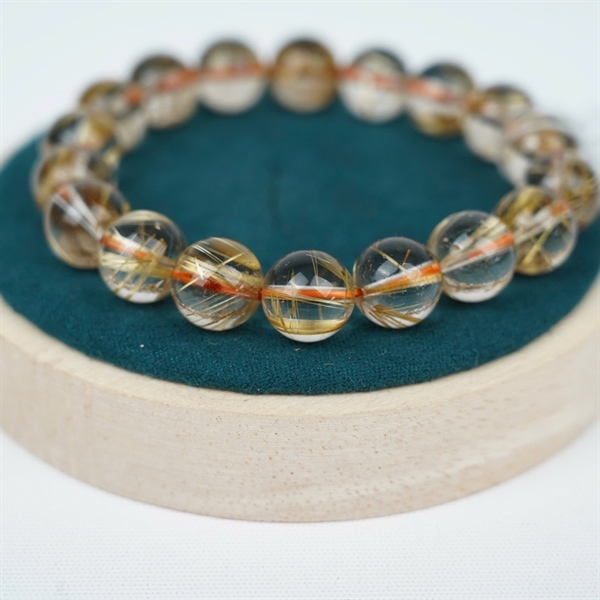 Vòng tay tóc vàng 18hạt ly11.82-11.5 (342357) KG+