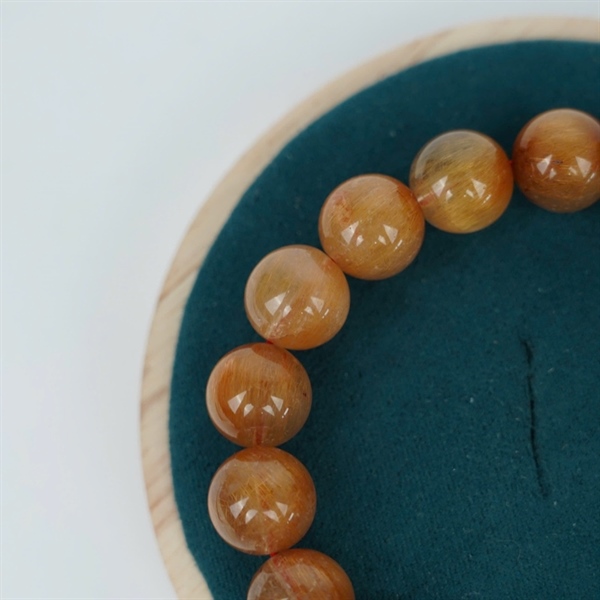 Vòng tay tóc nâu 17 hạt ly12.53-12.07 (947266) KG+