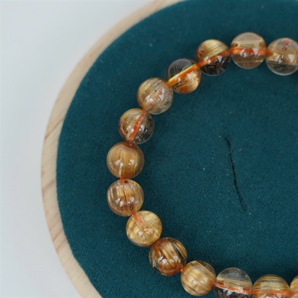 Vòng tay tóc vàng 22 hạt ly9.03-8.11 (336837) KG+