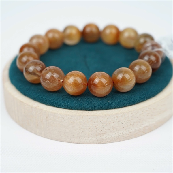 Vòng tay tóc nâu 17 hạt ly12.53-12.07 (947266) KG+