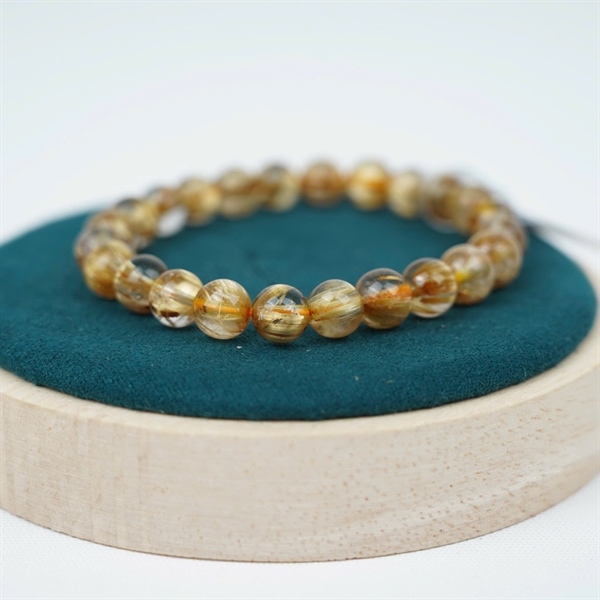 Vòng tay tóc vàng 24 hạt ly7.97-7.56 (448695) KG+