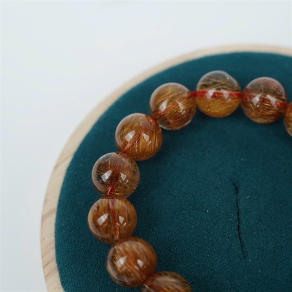 Vòng tay tóc nâu 17 hạt ly11.44-10.93 (533827) KG+