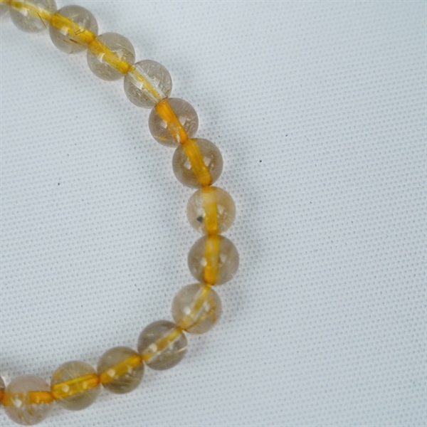 Vòng thạch anh tóc vàng ly6.9-7.7 +