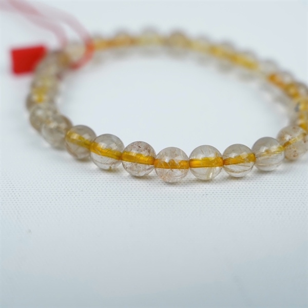 Vòng thạch anh tóc vàng ly6.9-7.7 +