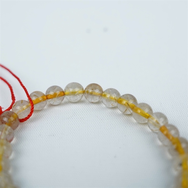 Vòng thạch anh tóc vàng ly6.9-7.7 +