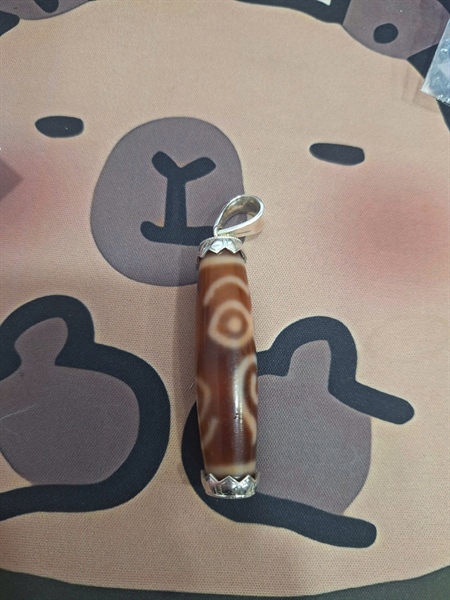 Dzi pháp nhãn 2 mắt phật bọc bạc KG+