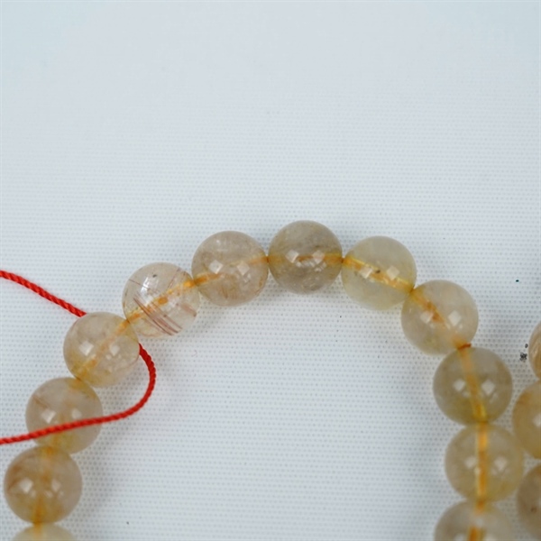 Vòng thạch anh tóc vàng ly11 +