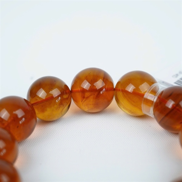 Vòng tay hổ phách 13 hạt ly18.96-18.06 (852583) KG+