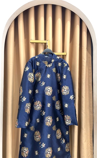 Áo dài gấm hoa viền xéo