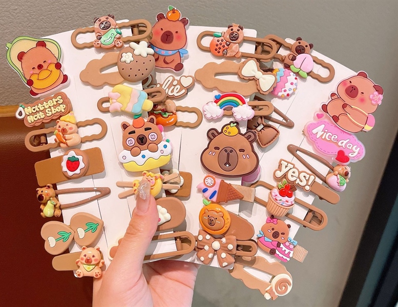 Set 5 vỉ,14 kẹp tóc/vỉ CAPYBARA, nhiều kiểu, charm silicon