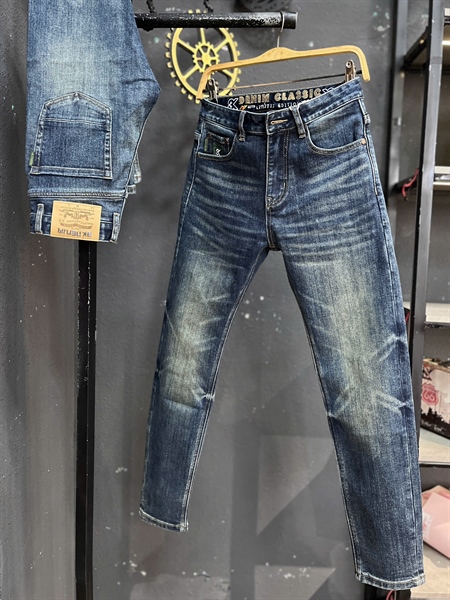 Jean Dài -QCSC- 2235 3k Denim xanh đậm was thêu chữ lưng Cam