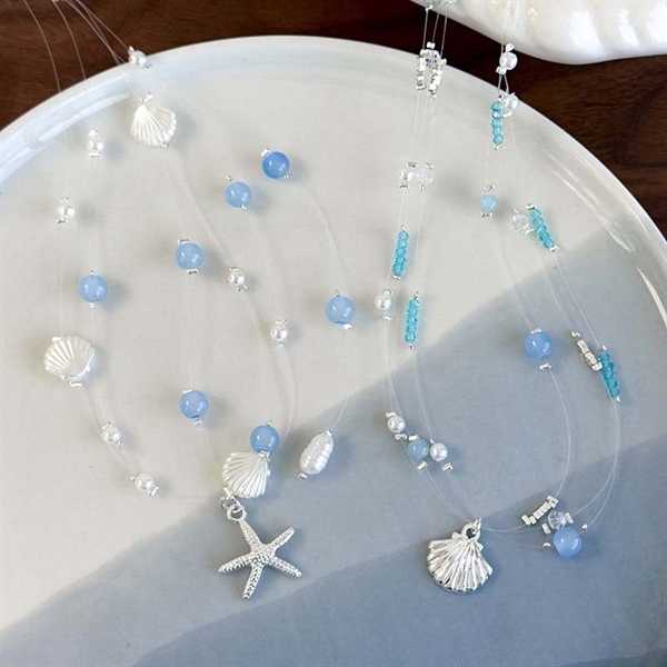 Vòng cổ handmade mix ngọc trai charm vỏ sò, sao biển