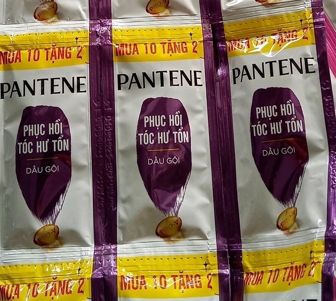 Dây gội patene phục hồi tóc hư tổn