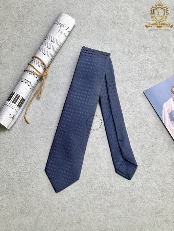 Cravate Hermes faconnee H marine / bleu hussard