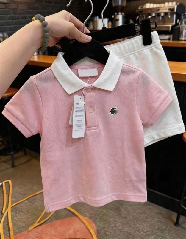 Bộ áo lacoste hồng quần trắng