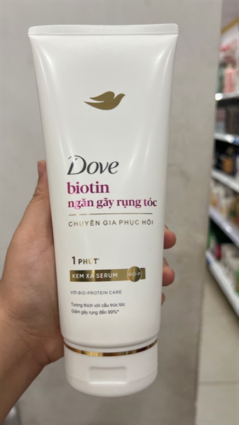 Kem xả serum Dove Biotin ngăn gãy rụng 320g