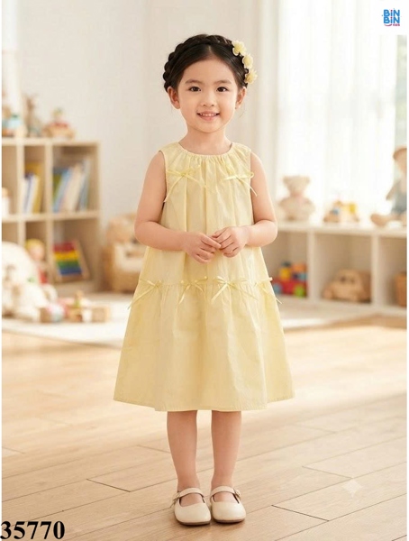 35770-Đầm bí vàng đính nơ