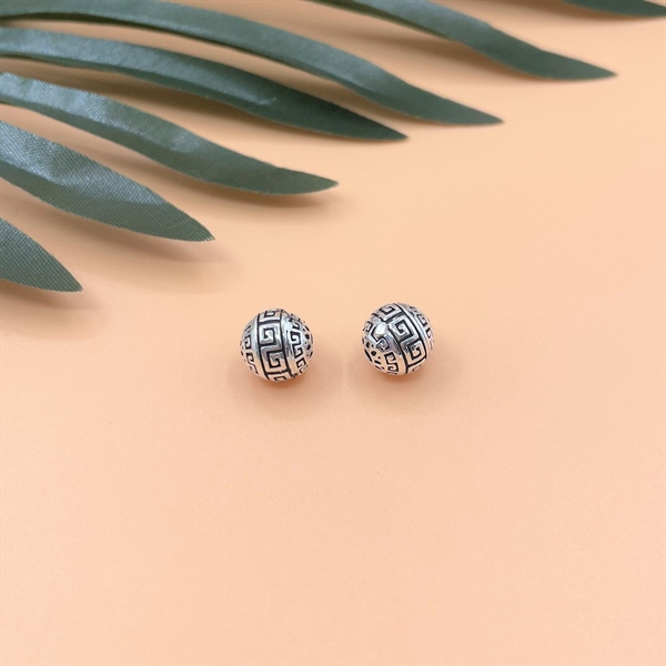 Bi tròn hoa văn 9.8mm CA104-1