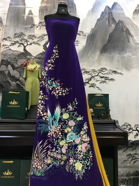 Áo dài tím huế phượng hoàng thêu tay