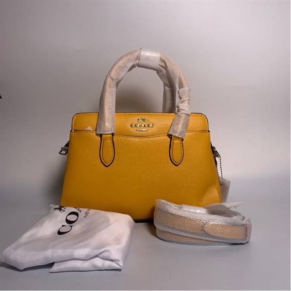 Túi Coach vàng KG+