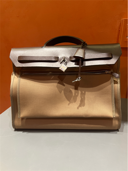 Túi Hermes xám viền da nâu KG+