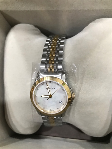 Đồng hồ nữ GG mặt tròn trắng viền vàng KG+