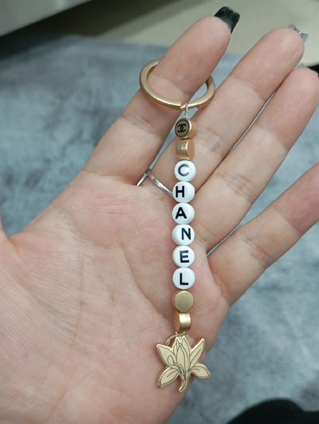 Móc khóa hạt Chanel KG+