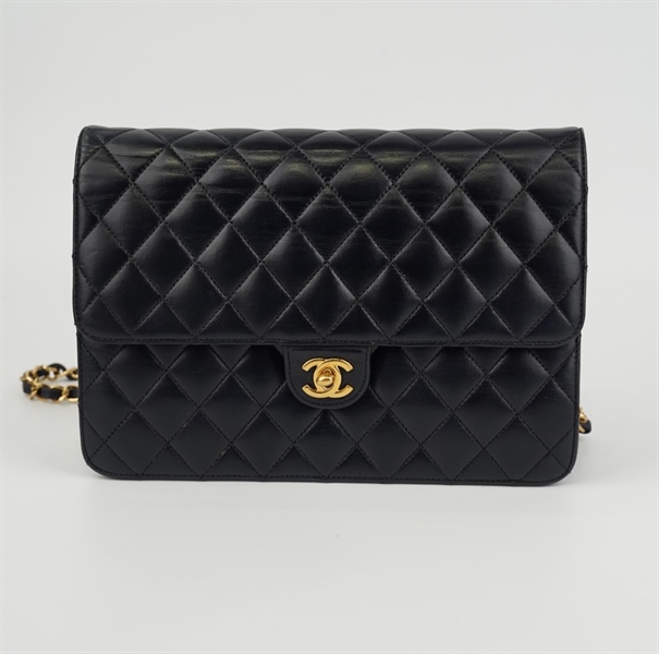 Túi chanel đen khóa vàng lòng đỏ nâu +