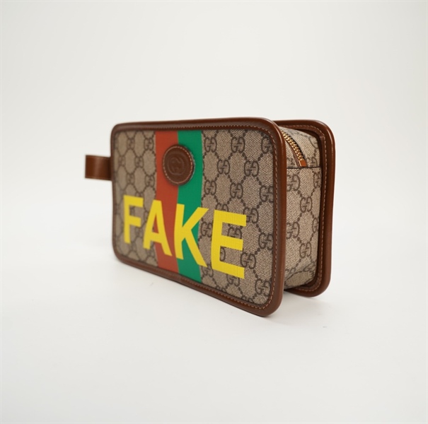 túi GC Clutch viền nâu chữ FAKE sz22 TB+