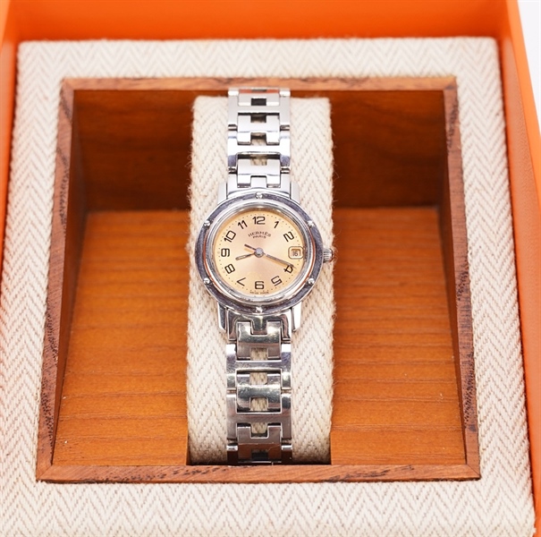 Đồng hồ Hermes tròn dây bạc KG+