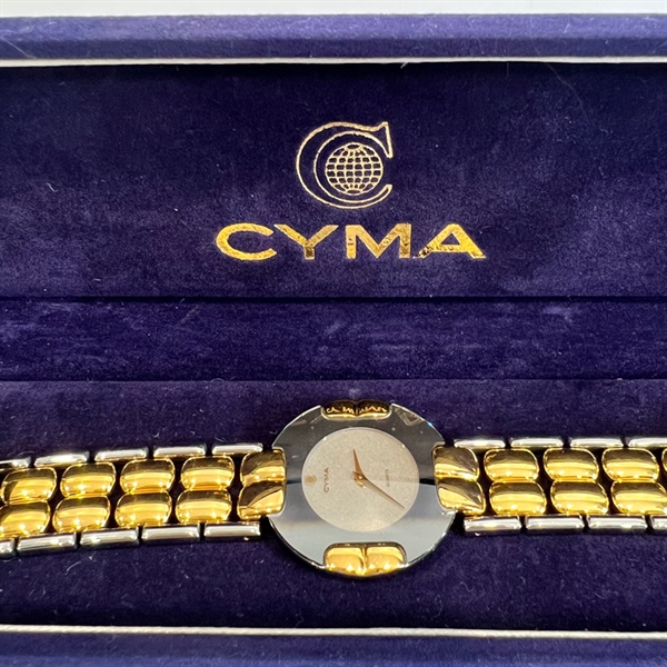 Đồng hồ Cyma hộp tím +