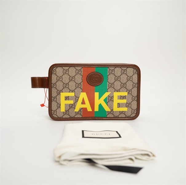 túi GC Clutch viền nâu chữ FAKE sz22 TB+