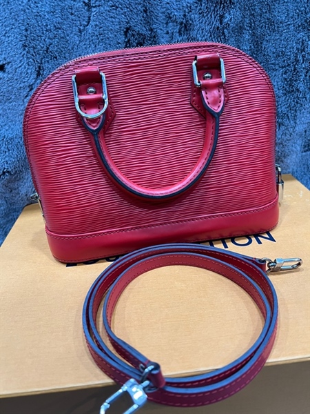 Túi LV Alma vân đỏ zip trắng KG+