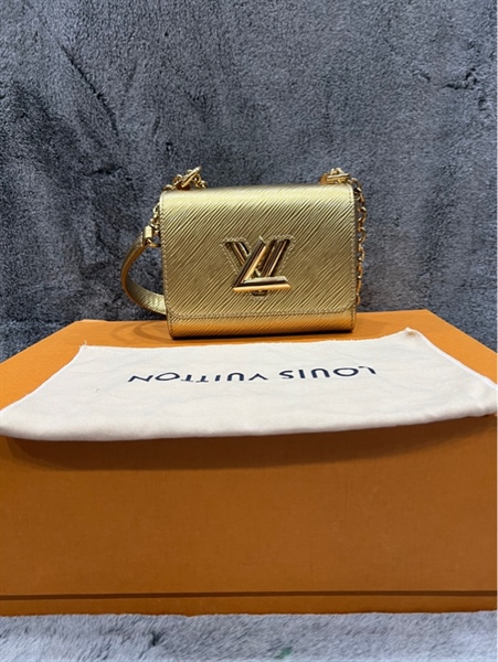 Túi LV vàng đồng khoá xoay+