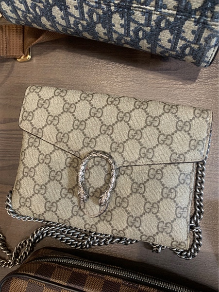 Túi Gucci đầu rồng