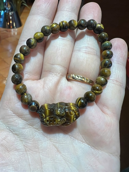 Vòng tay đá mắt hổ đính Cụ Tỳ Hưu +