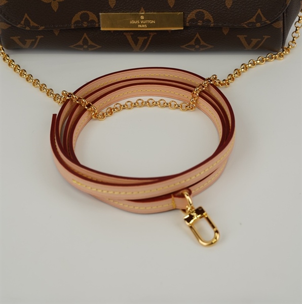 Túi LV kẹp nách hoa nâu +