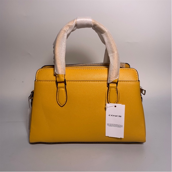 Túi Coach vàng KG+