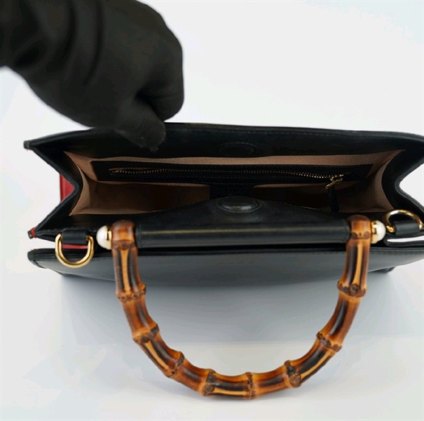 Túi GC đen quai trúc lòng đỏ +