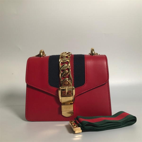 Túi GC đỏ xích vàng nhỏ xọc xanh KG+