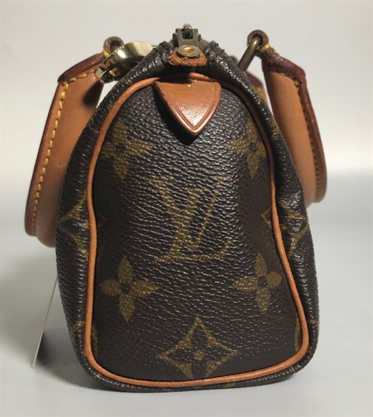 Túi LV nhỏ có quai xách vàng KG+