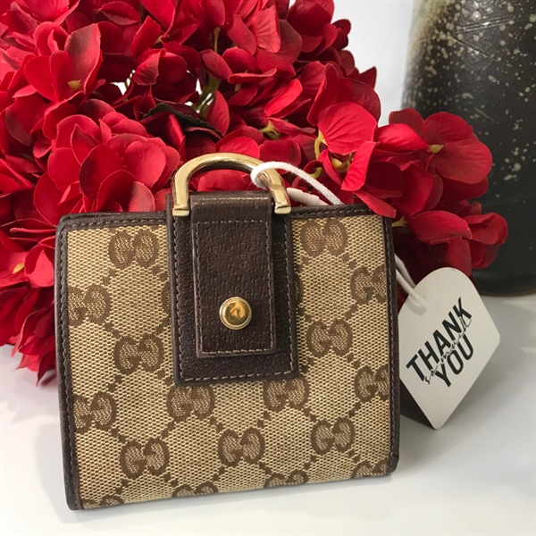 Ví cầm tay nam Gucci