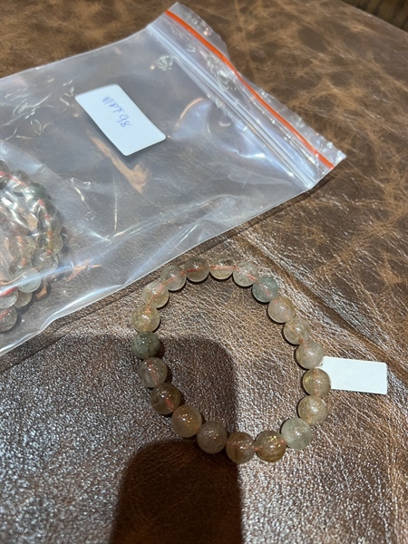 Vòng tay thạch anh tóc vàng 4 li +