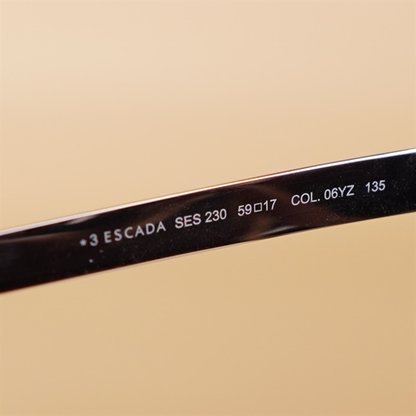 Kinh Escada nâu kim loại KG+