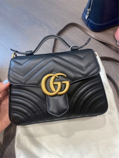 Túi Gucci khoá vàng
