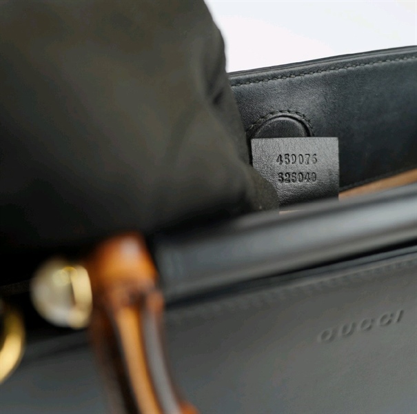 Túi GC đen quai trúc lòng đỏ +